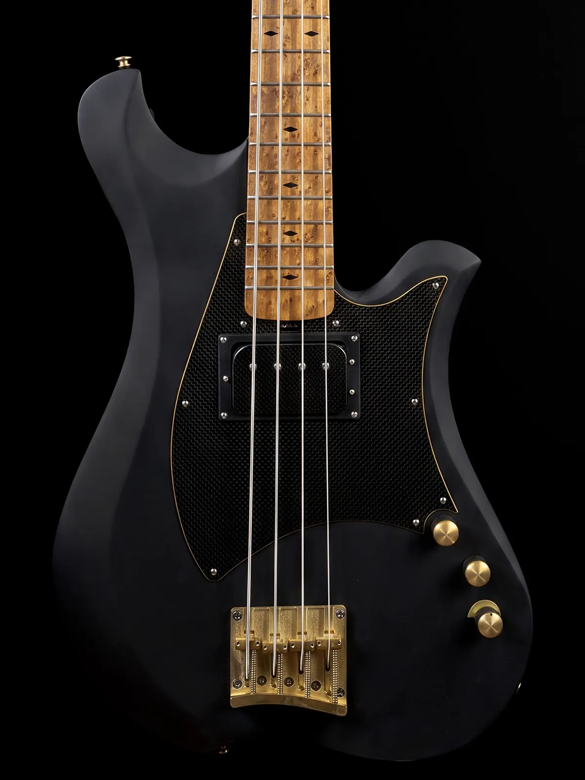 Tim Lefebvre's black Marleo Officina Bass with gold hardware, by Bacci Guitars